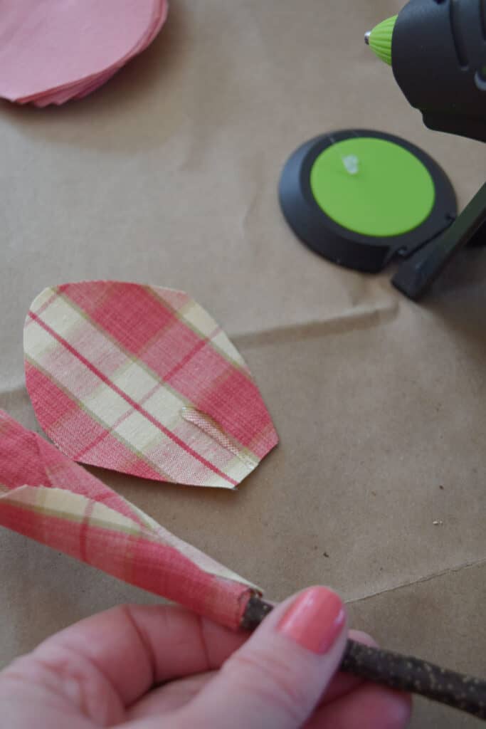 Crafting DIY fabric tulips.