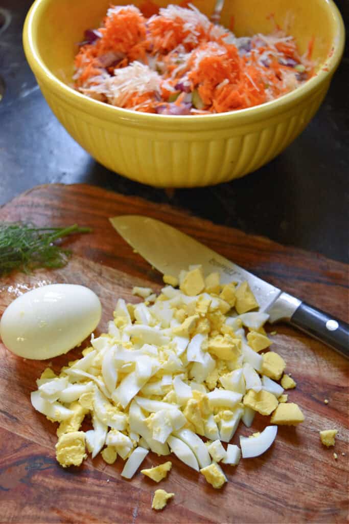 Cutting up hard boiled eggs.