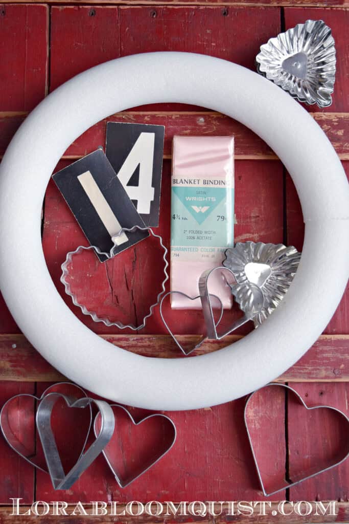 Styrofoam wreath and old cookie cutters to craft a DIY Valentines wreath