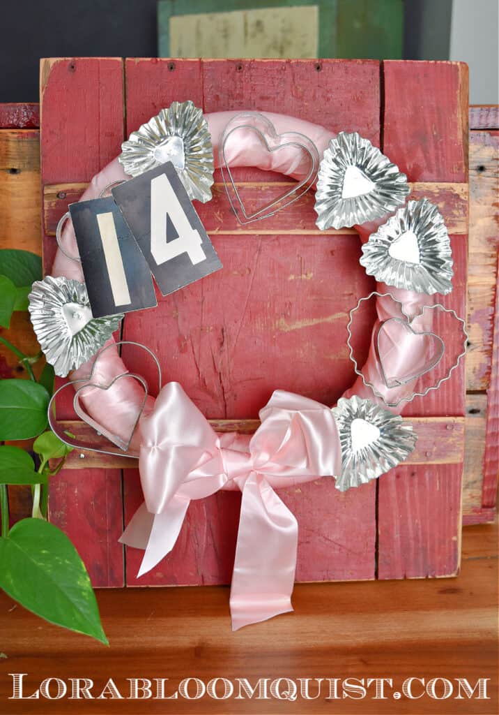 DIY Valentines wreath with old cookie cutters and vintage.