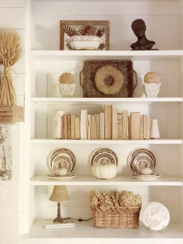 Neutral fall bookshelf display.