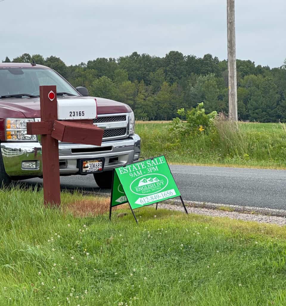 Estate Sale green sign in grass.