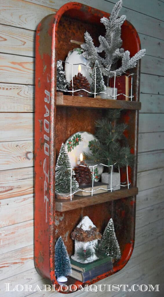 Upcycled old wagon shelf styled with Christmas decorations.