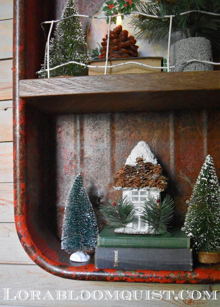 Old red metal wagon patina and Christmas decor.