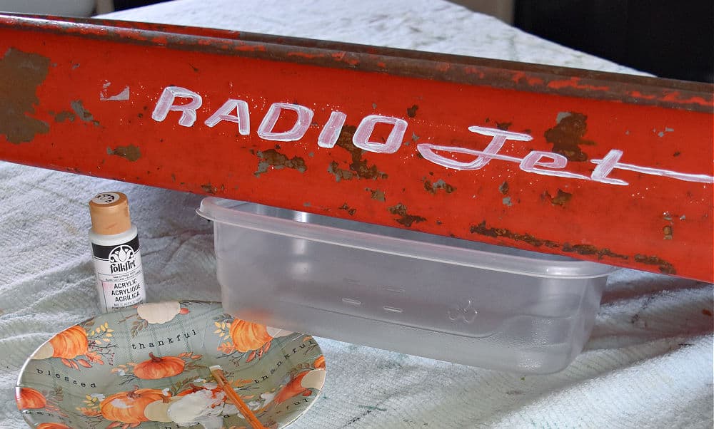 Old red wagon with Radio Jet words.