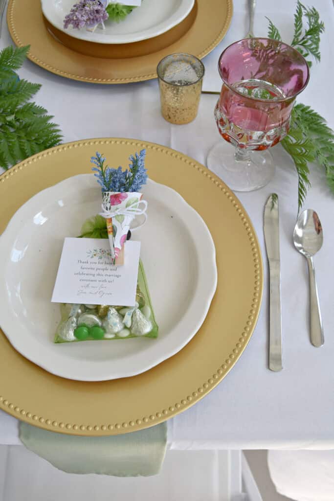 Wedding reception table setting with vintage goblets.