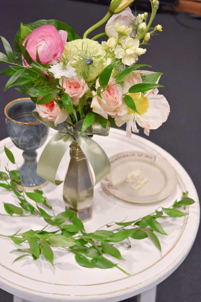 Summer bouquet of flowers on communion table.