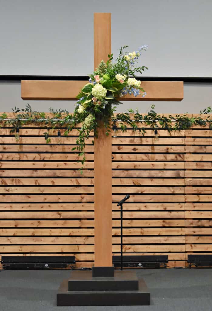 Floral arrangement on church cross.