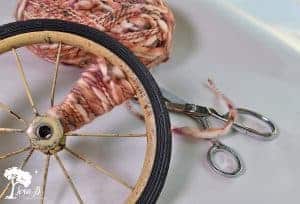 how to repurpose a vintage wheel into a pumpkin