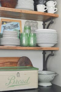 Open wood shelves in the kitchen.