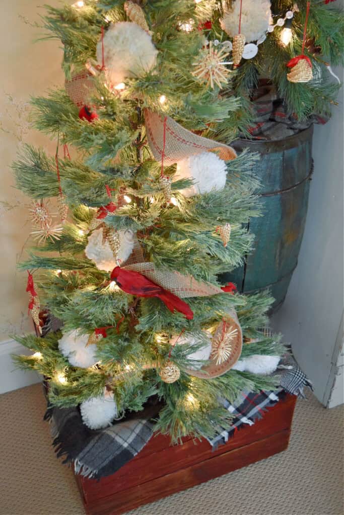 Christmas tree in red crate.