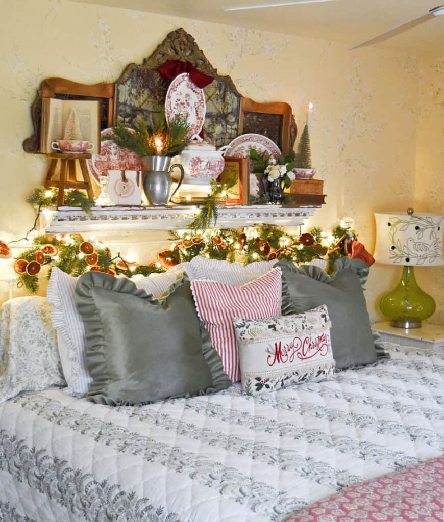 Christmas decorated bedroom with vintage red and white transferware.