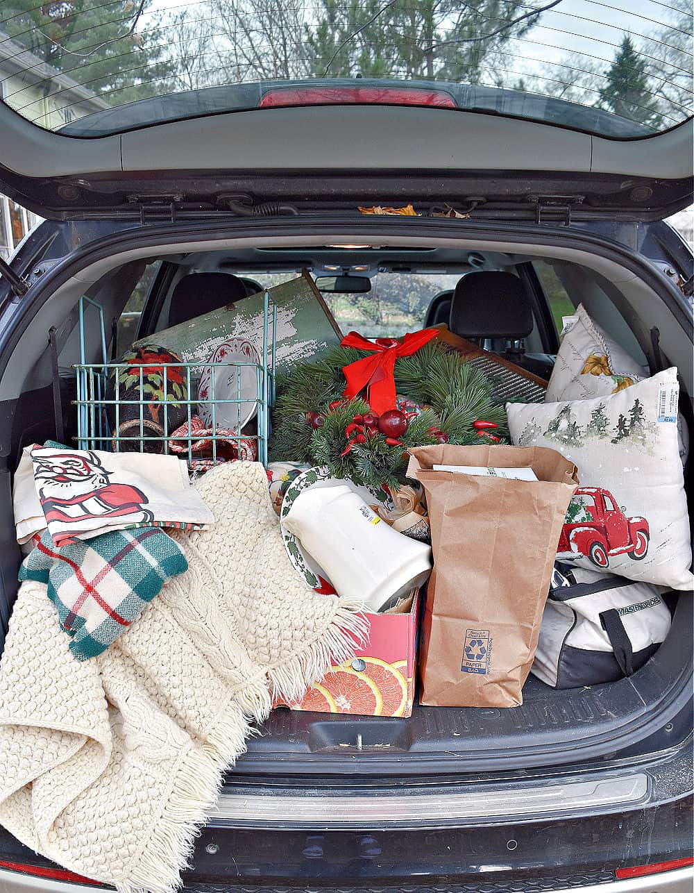 Car full of vintage Christmas decor finds.