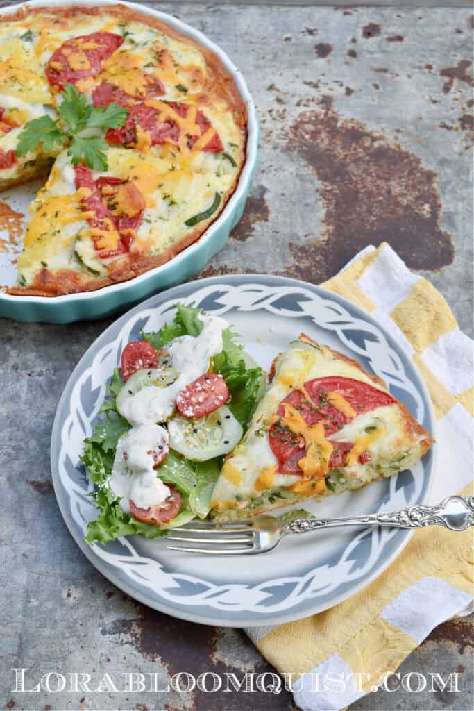 Zucchini quiche, served with a green salad.