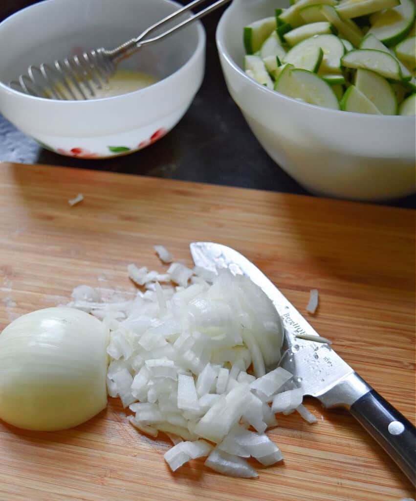 Cutting white onion.