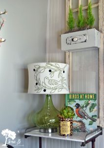 Green lamp with bird shade